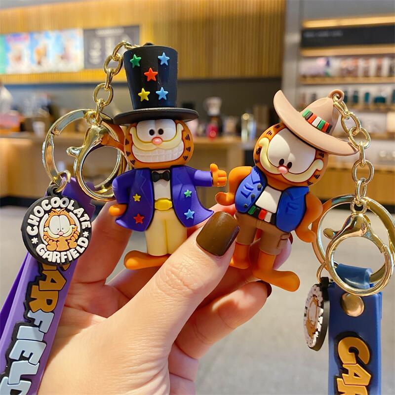 ガーフィールド漫画バックパックチェーンカーアクセスキーチェー - Car Accessories Workshop のレビューと価格